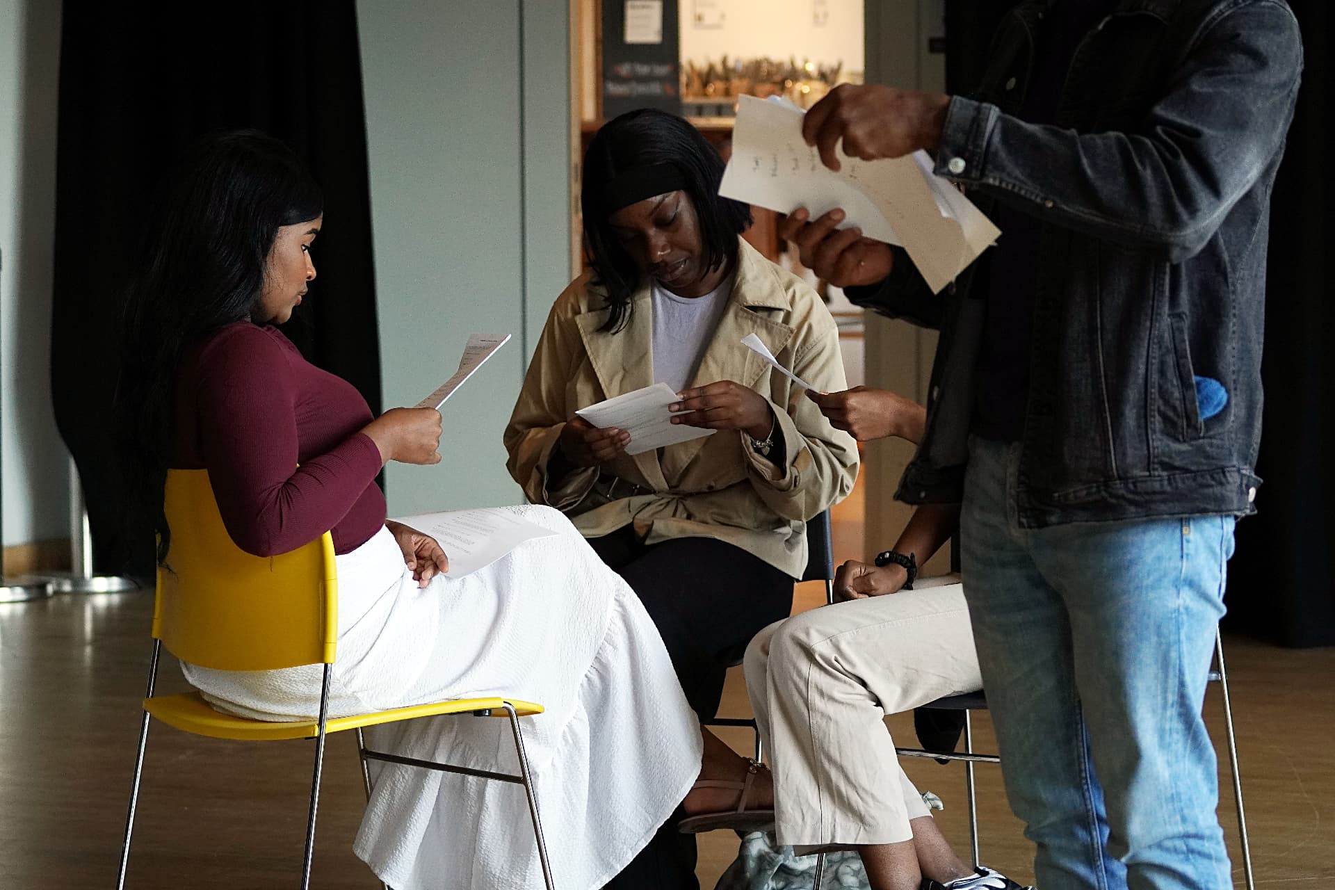 Actors reading through scripts together