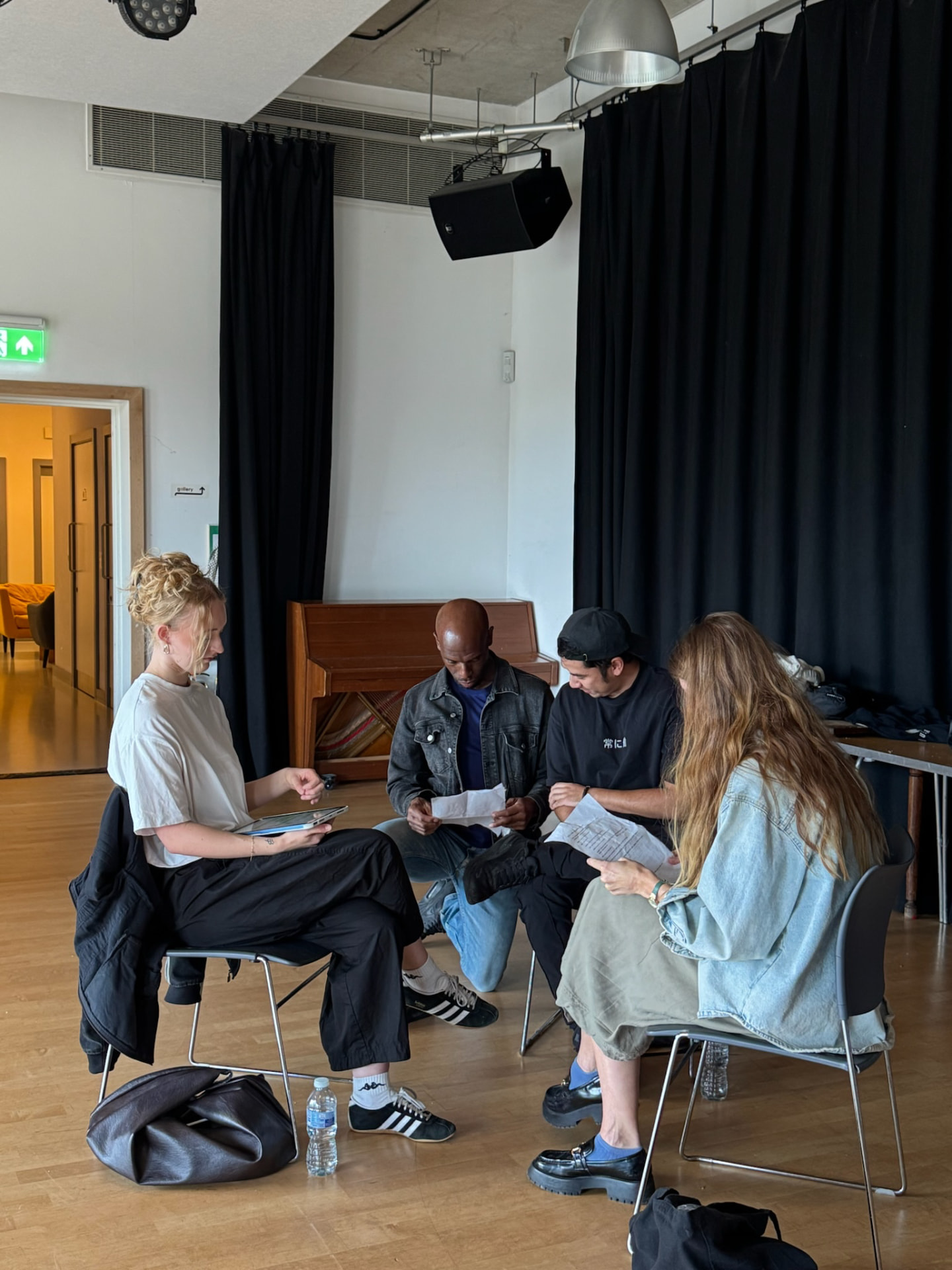 A small group reading through a script together